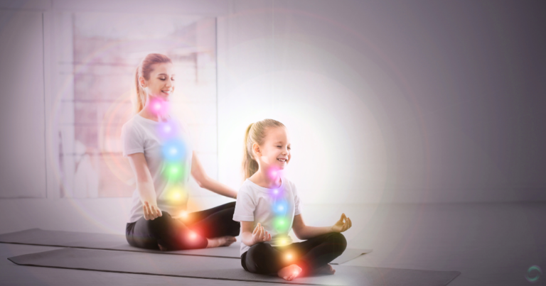 a woman and a girl practicing rainbow meditation with rainbow colored lights